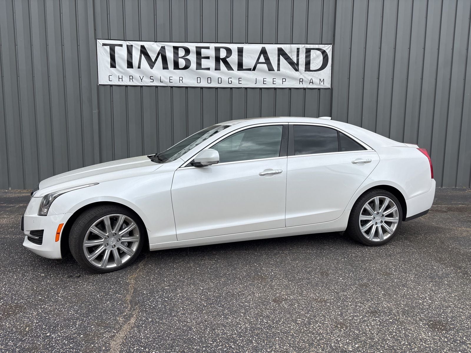 2018 Cadillac ATS Luxury in Crystal White Tricoat — front three-quarter view