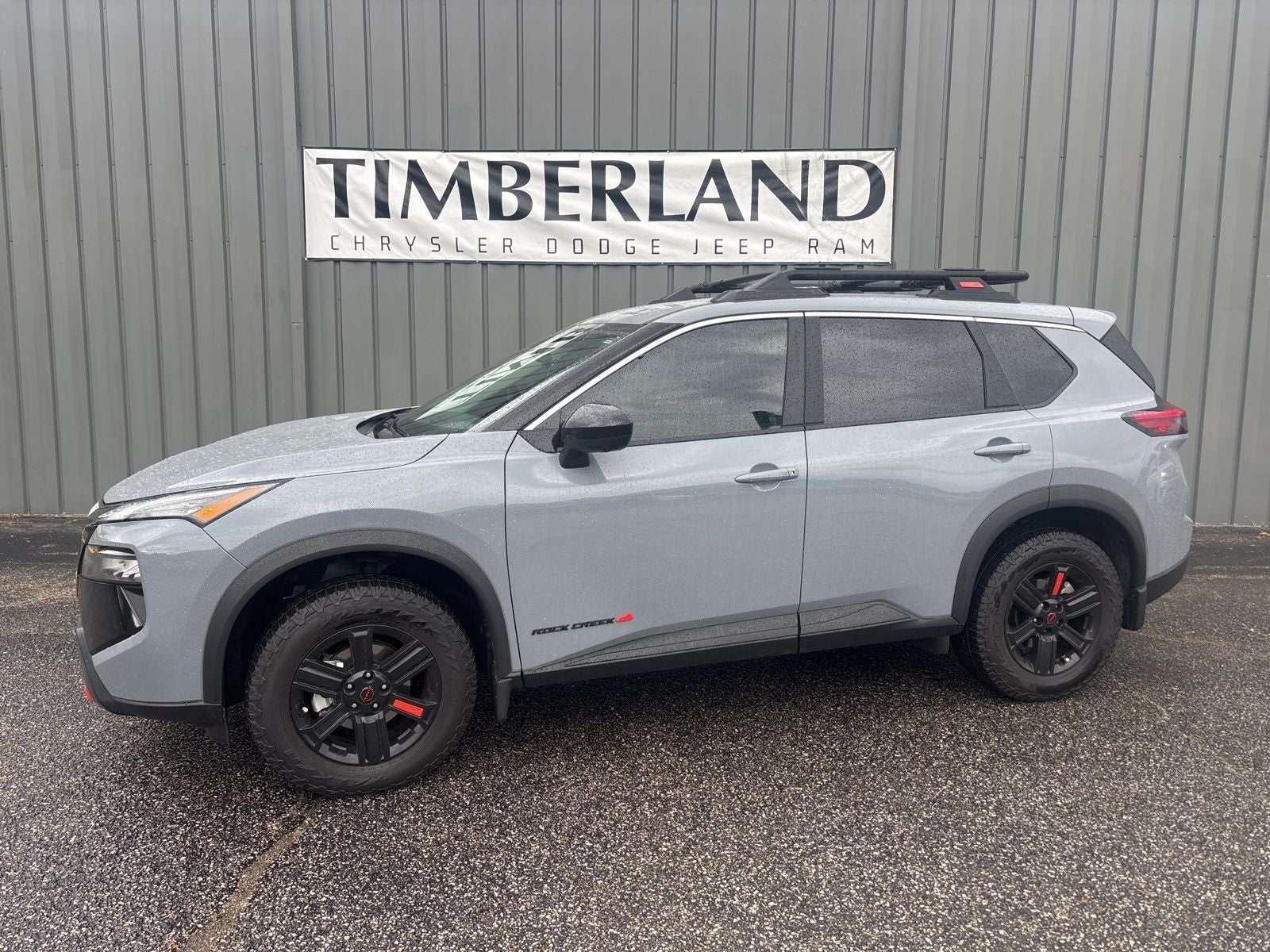 2026 Nissan Rogue Rock Creek in Boulder Gray Pearl — front three-quarter view